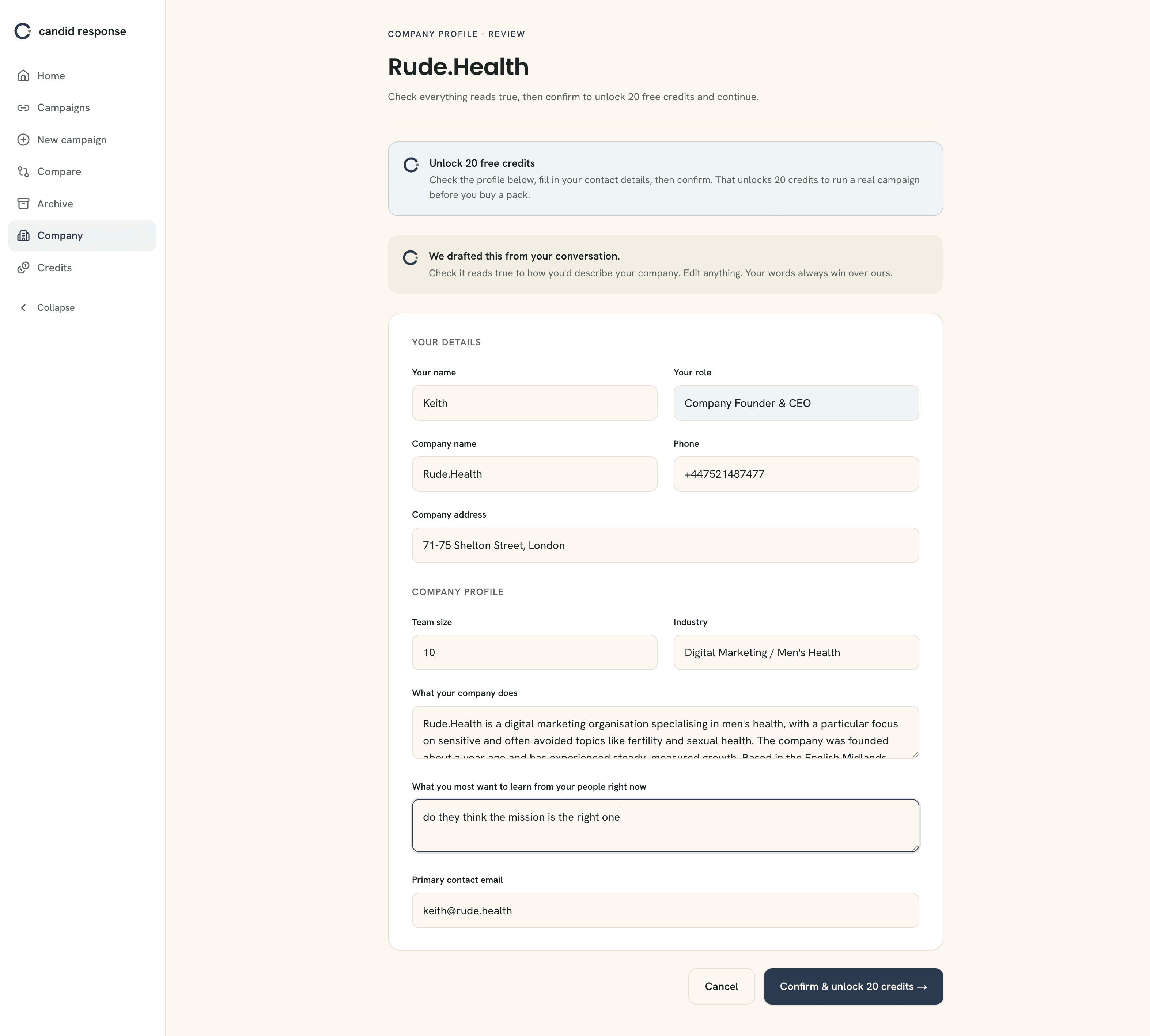 The profile review screen, with editable company details and a Confirm and unlock 20 credits button.